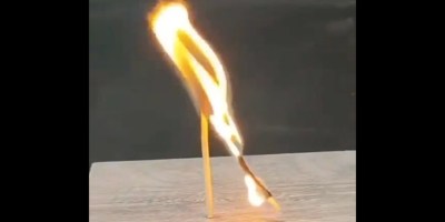These Burning Matchsticks Look Like They’re Kissing After They’re Lit
