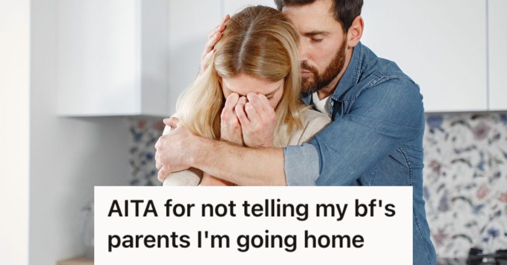 Woman is crying and the man is hugging her from behind, trying to comfort her