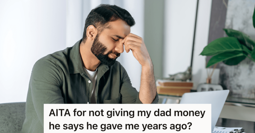 stressed out man sitting at a desk